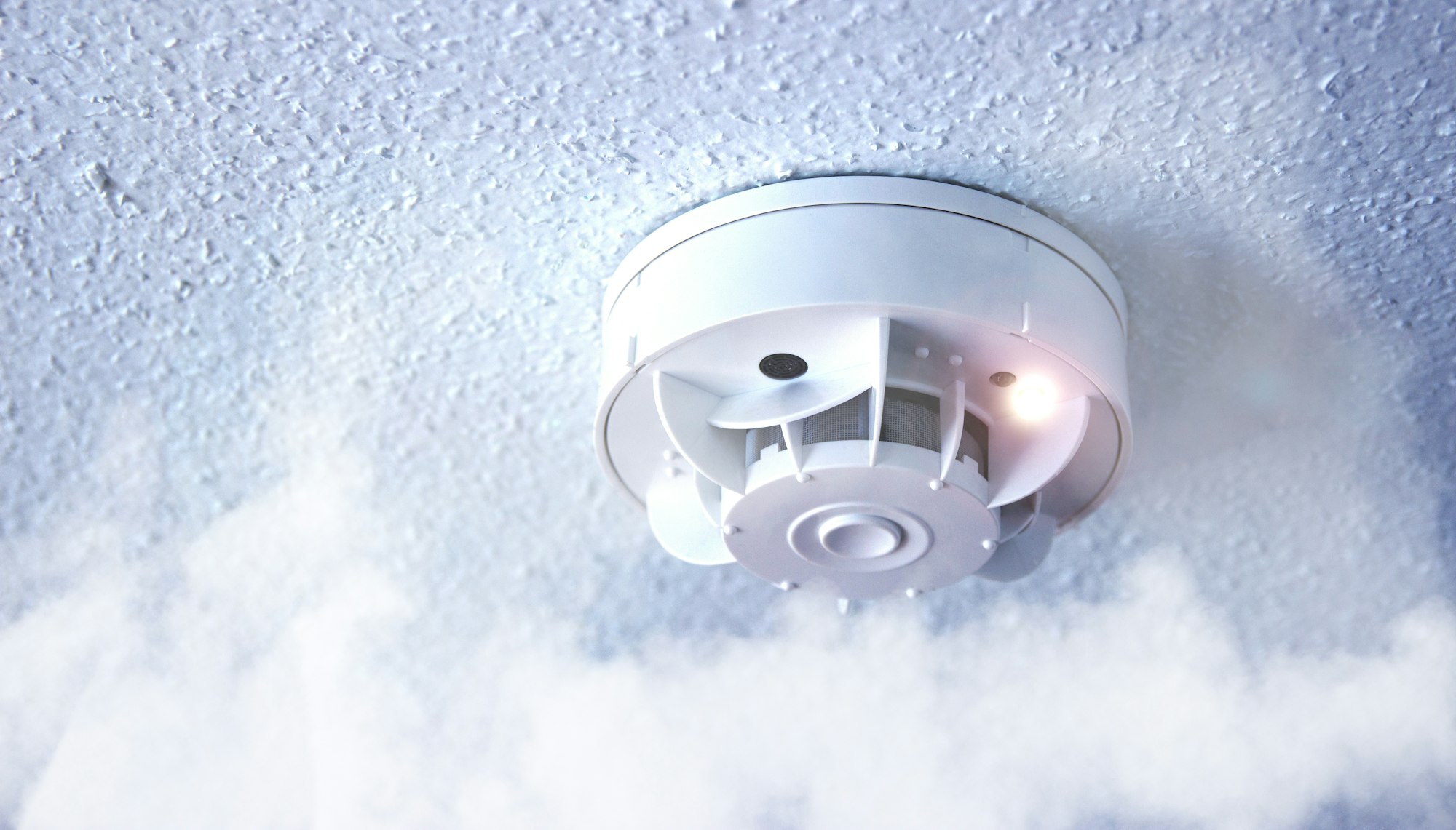 Smoke, fire detector. Fire protection, with smoke in the foreground.