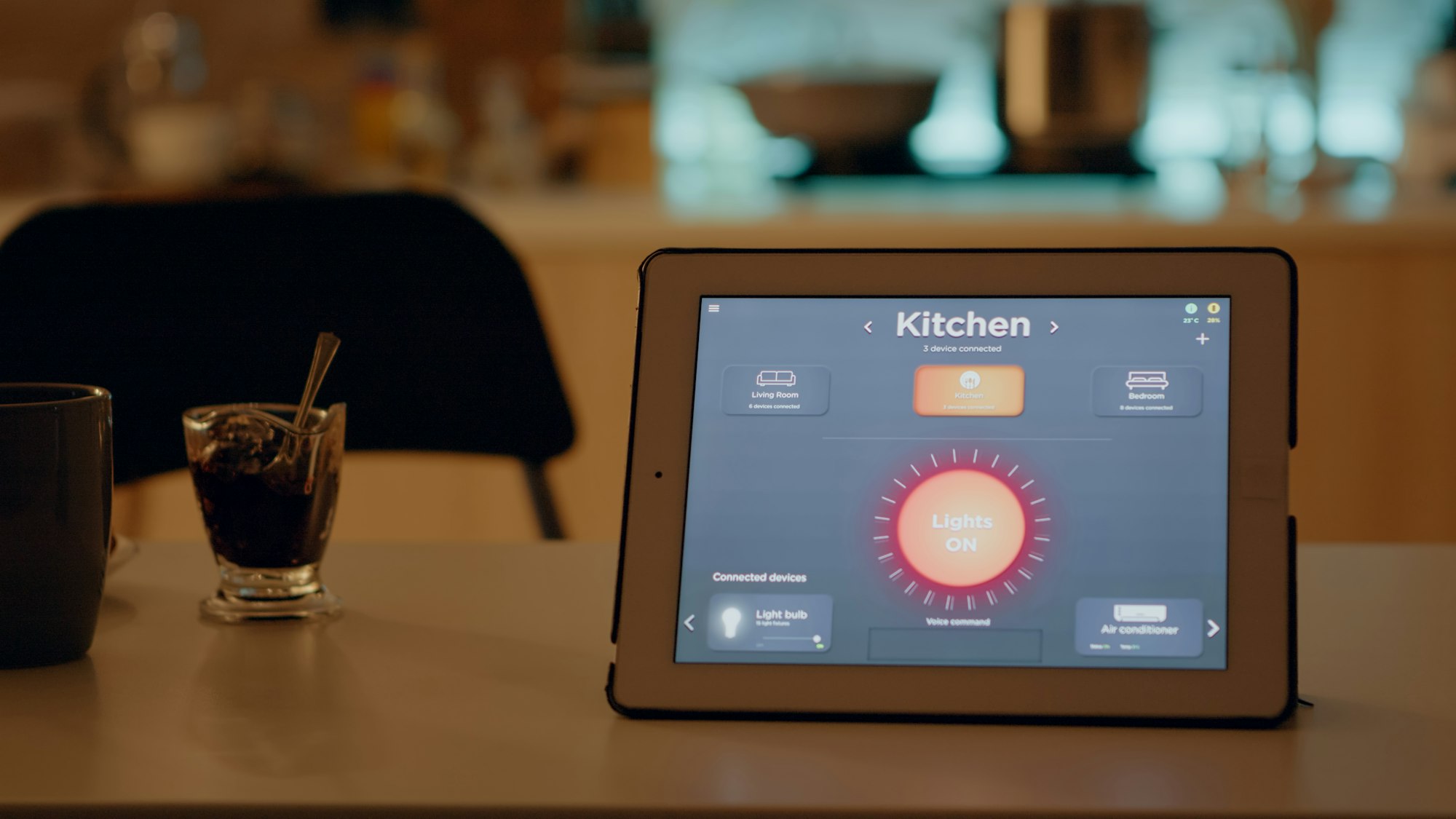 Close up of tablet with wireless lighting automation software placed on table