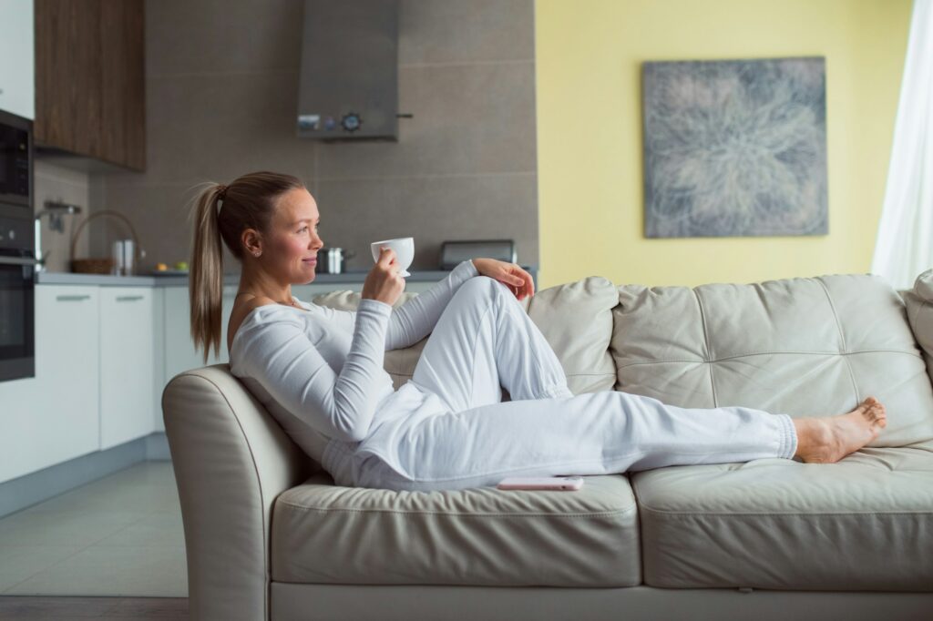 Woman relax at home on sofa